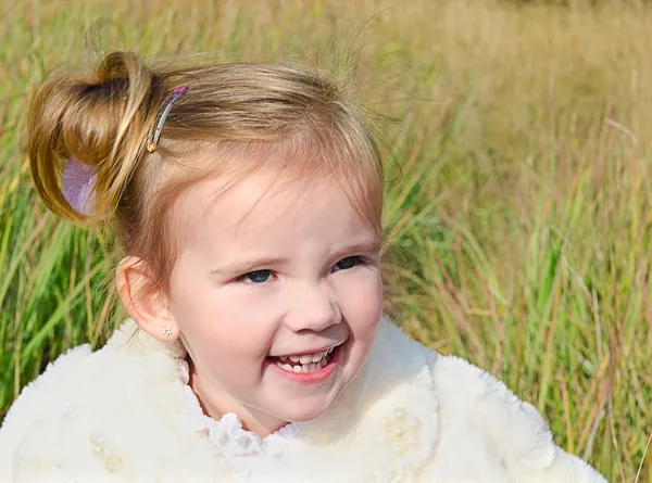 stock image Portrait of a cute little girl outside