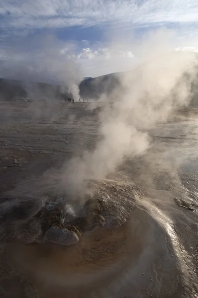 Erupting geyser in geothermal field — Stok Foto