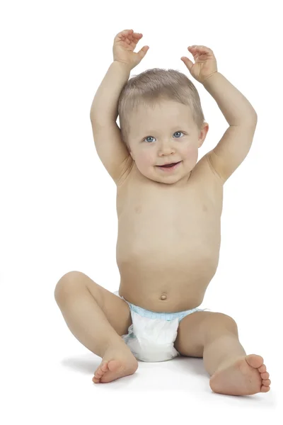 Bambino seduto con le braccia alzate — Foto Stock