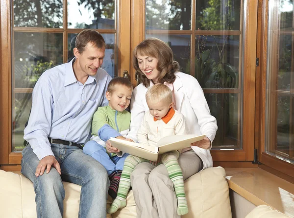 Family reading book Royalty Free Stock Images