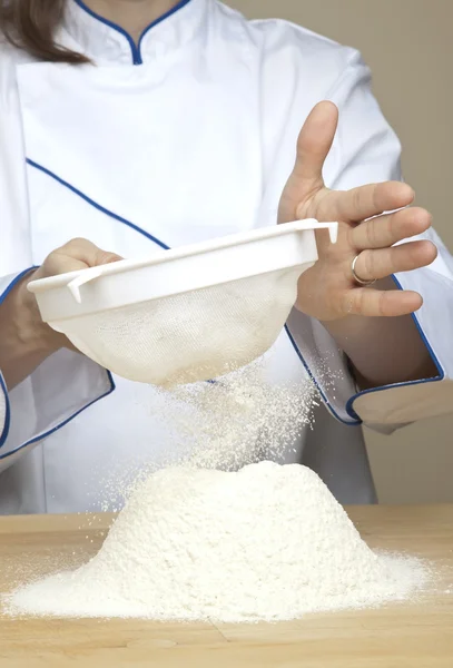 stock image Flour sifting