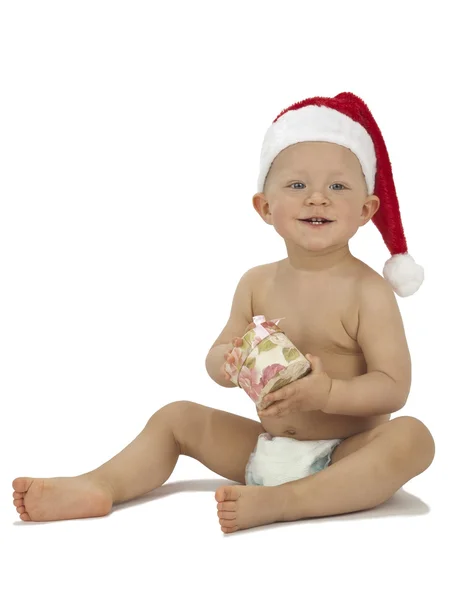 Маленький Санта с подарочной коробкой — стоковое фото