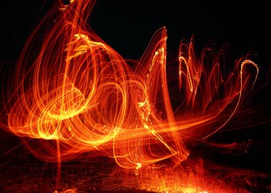 A huge column of flames on a black background clipart