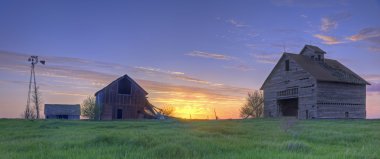 Abandoned Farmhouse and Barn At Sunset clipart