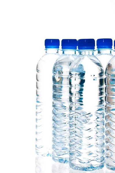 Water bottles isolated on white — Stock Photo, Image