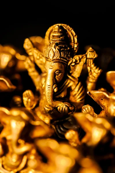 stock image Ganesha amongst Ganesha's over black