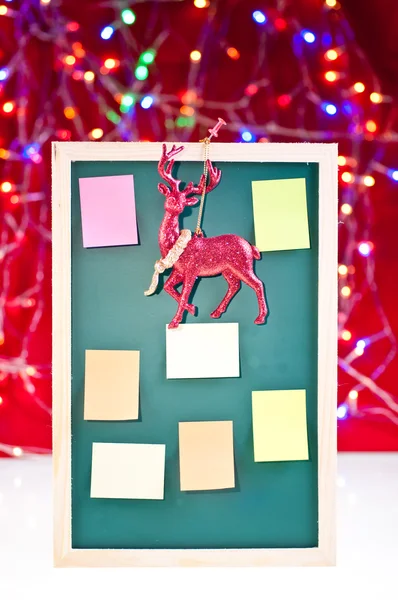 Christmas notice board with reindeer decoration — Stock Photo, Image