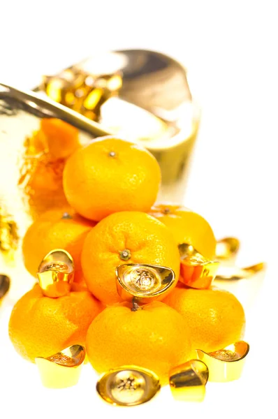 Tangerini e lingotti d'oro da vicino — Foto Stock