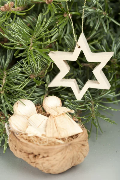 Babies and star Christmas ornament — Stock Photo, Image