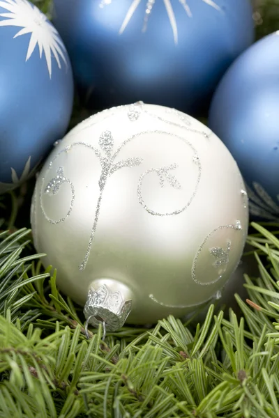 Christmas globes on pine tree — Stock Photo, Image