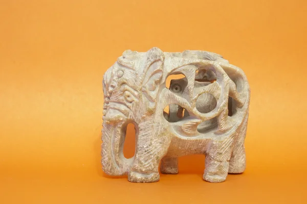 The carved flinty elephant within elephant calf . Stock Photo