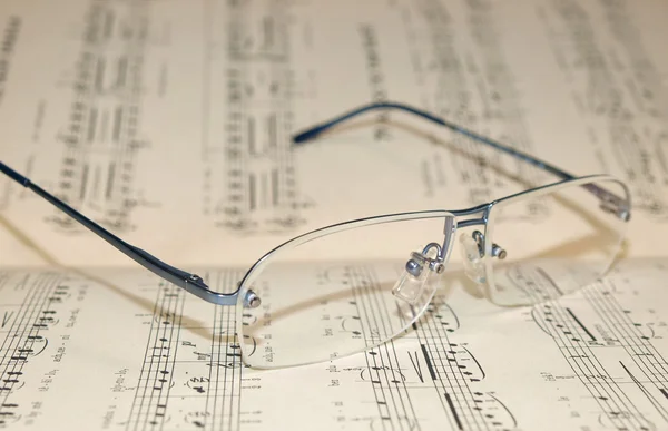 stock image Glasses laying on score