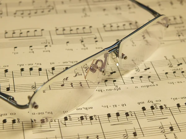 Stock image Glasses laying on score