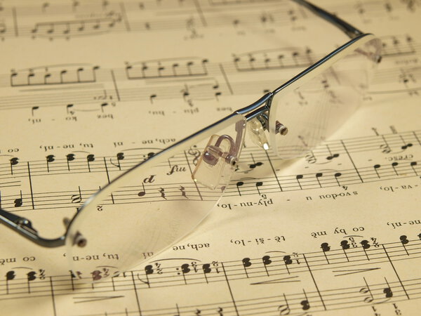 Glasses laying on score