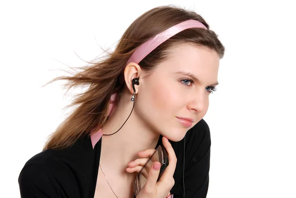 Retrato da menina bonita com fones de ouvido em orelhas — Fotografia de Stock