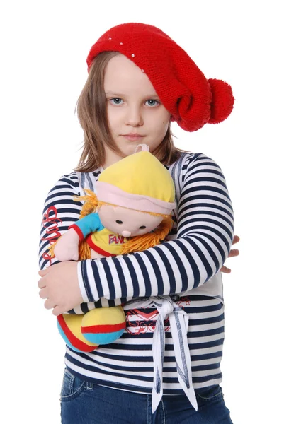 La hermosa niña con una muñeca de trapo — Foto de Stock