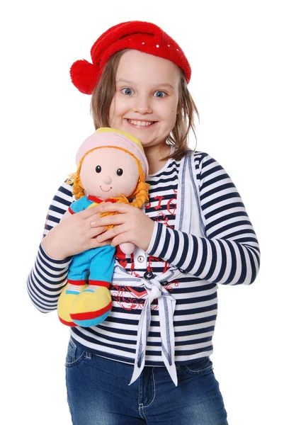 La hermosa niña con una muñeca de trapo — Foto de Stock