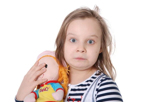 The girl and a doll — Stock Photo, Image
