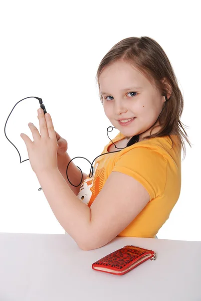 La bambina con un telefono cellulare — Foto Stock