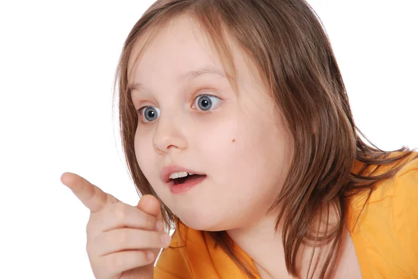 Das kleine Mädchen zeigt mit dem Finger — Stockfoto