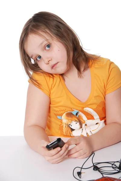 Το μικρό κορίτσι με ένα κινητό τηλέφωνο — Φωτογραφία Αρχείου