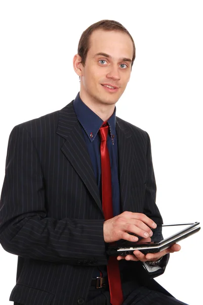 Przedsiębiorczy młodzieniec z laptopem — Zdjęcie stockowe