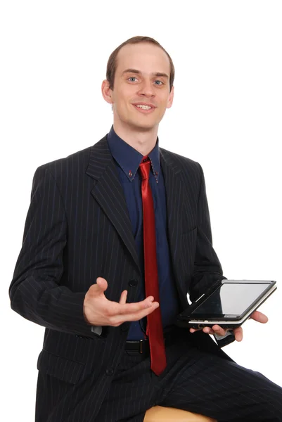Il giovane uomo intraprendente con il computer portatile — Foto Stock
