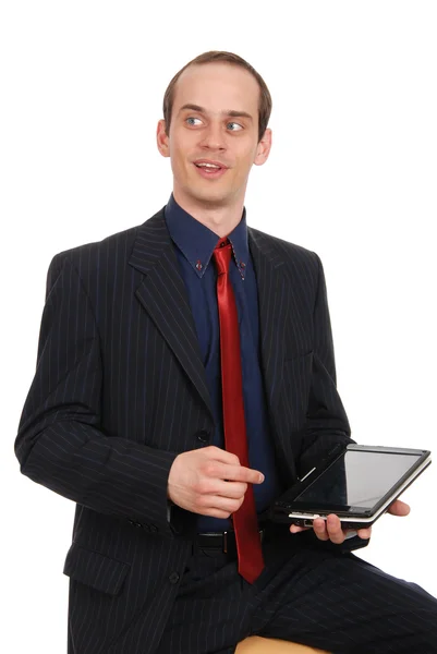 A vállalkozó kedvű fiatalember a laptop — Stock Fotó