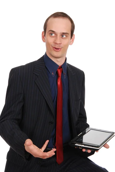 O homem empreendedor jovem com o computador portátil — Fotografia de Stock