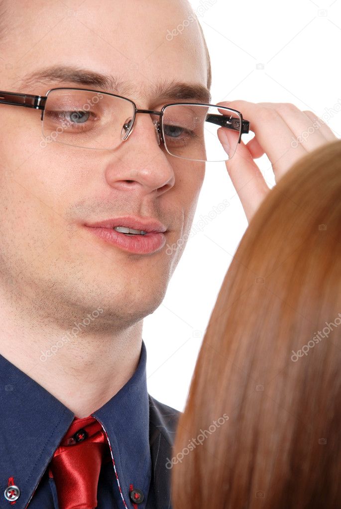 Young woman tries on glasses to the businessman