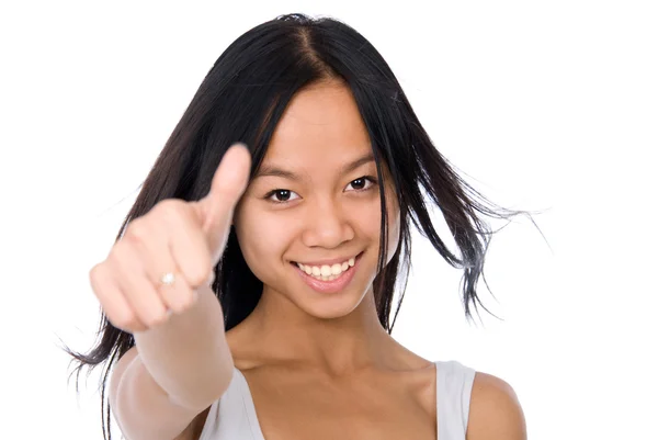 Hezká mladá žena ukazuje palec — Stock fotografie