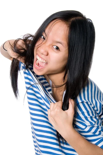 Den asiatiska tjejen tårar en Kolt — Stockfoto