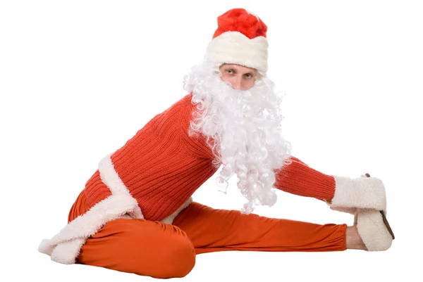 Weihnachtsmann macht Yoga — Stockfoto