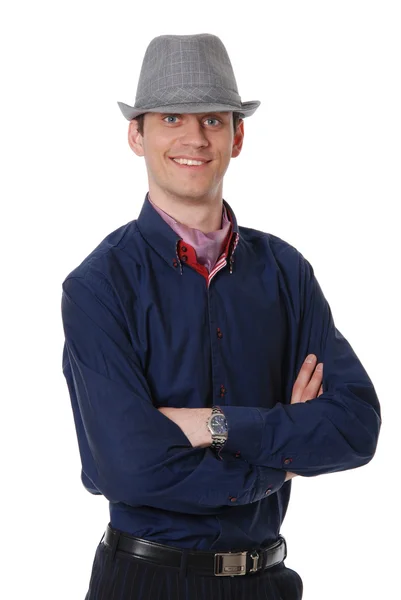 De leuke jonge vent in een hoed — Stockfoto