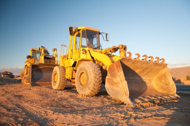 Two Tractors at Work clipart