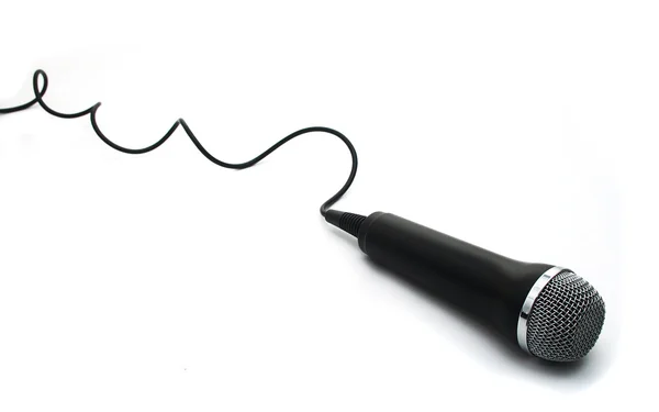 Изолированный микрофон и шнур — стоковое фото