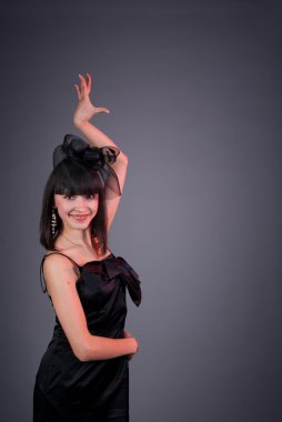 Beautiful girl dancing black dress