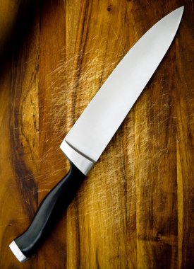 Knife on Chopping Board clipart