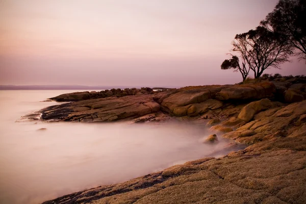 Pastel rotsen bij zonsondergang — Stockfoto
