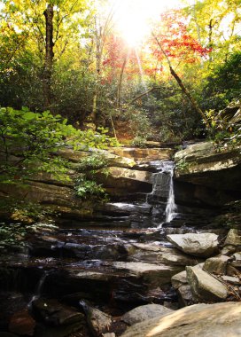 Small Waterfall with Sun beams clipart