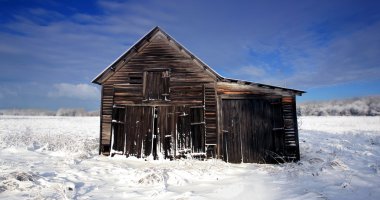 A snow covered barn