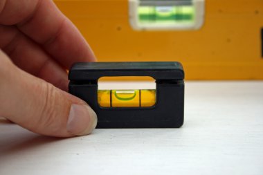 Spirit level being used. clipart