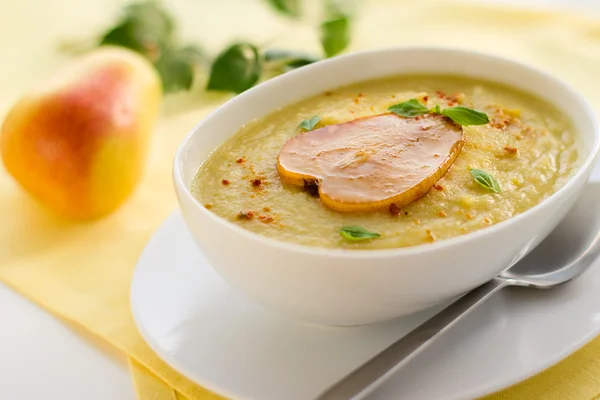 Parsnip cream soup with pear and curry — Stock Photo, Image