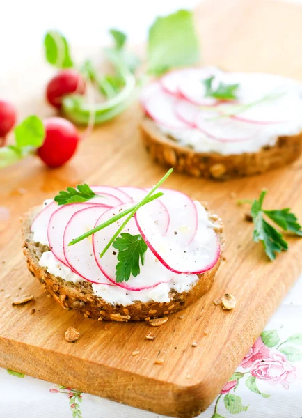 Soft cheese and radishes