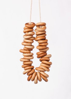 Sheaf of bagels, a bunch of bagels on a white background clipart