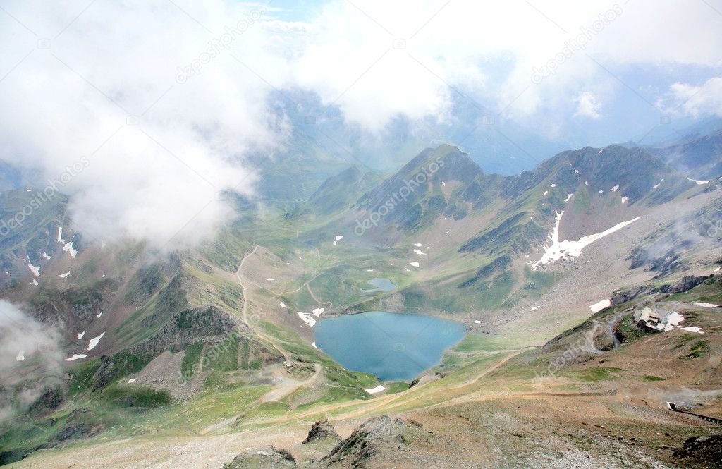 Mountain lake in the mist. French Pyrenees