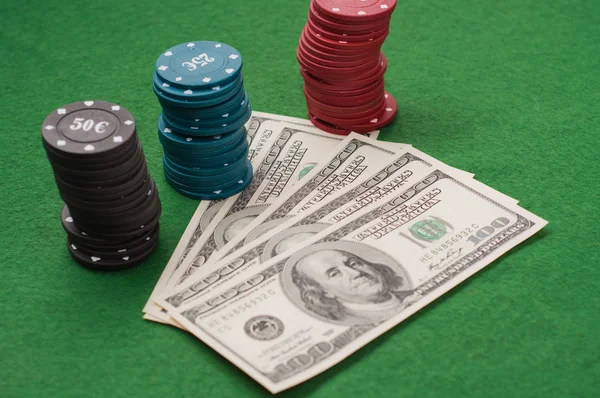 Casino gambling chips and bucks — Stock Photo, Image