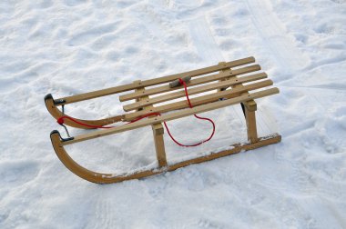 Sled in the snow clipart