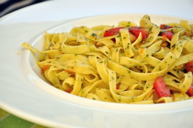 Tagliatelle with Tomatoes and herbs clipart