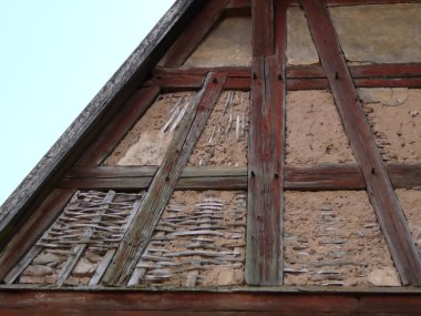 Timber-framed house in need of repairs clipart